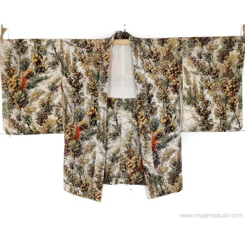 Haori tradizionale vintage, giacca giapponese in pura seta, realizzata e cucita a mano, di colore verde con fantasia floreale.
